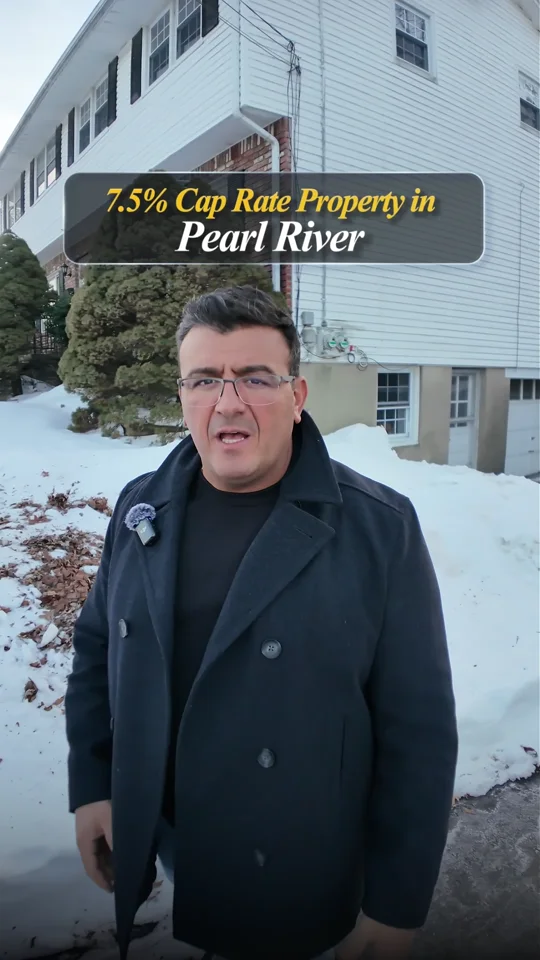 Real estate presenter outside a home